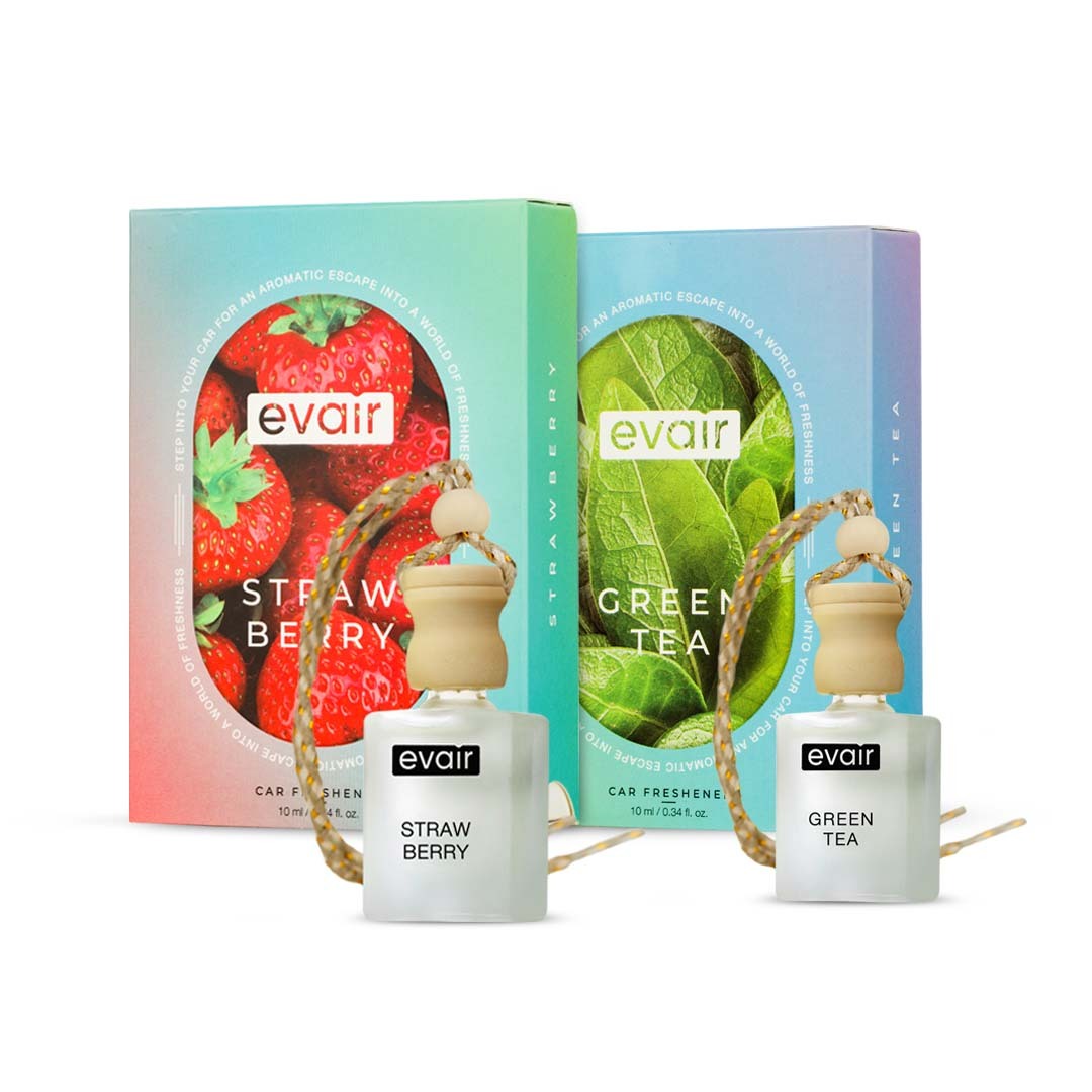 Two Evair car fresheners in strawberry and green tea scents.